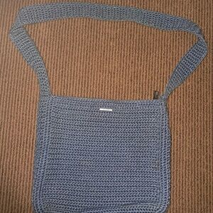 The Sak Blue Crochet Shoulder Bag with Navy Blue Lining and Zipper Closure